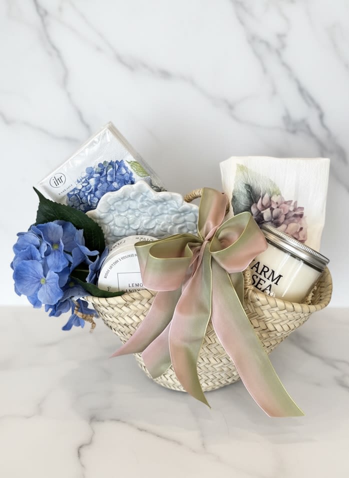 Hydrangea Bundle  - A sweet hydrangea gift basket perfect for Mother's Day, birthdays and beyond!  Tucked into a woven French market bag is a thoughtful mix of treats including a stem of faux blue hydrangea, luxurious seasonal hand cream and candle from Farm + Sea*, a charming hydrangea dish and cotton hydrangea flour sack towel. A thoughtful way to brighten someone's day!   * we will pick our favorite scents unless you leave a preference in the order notes. 