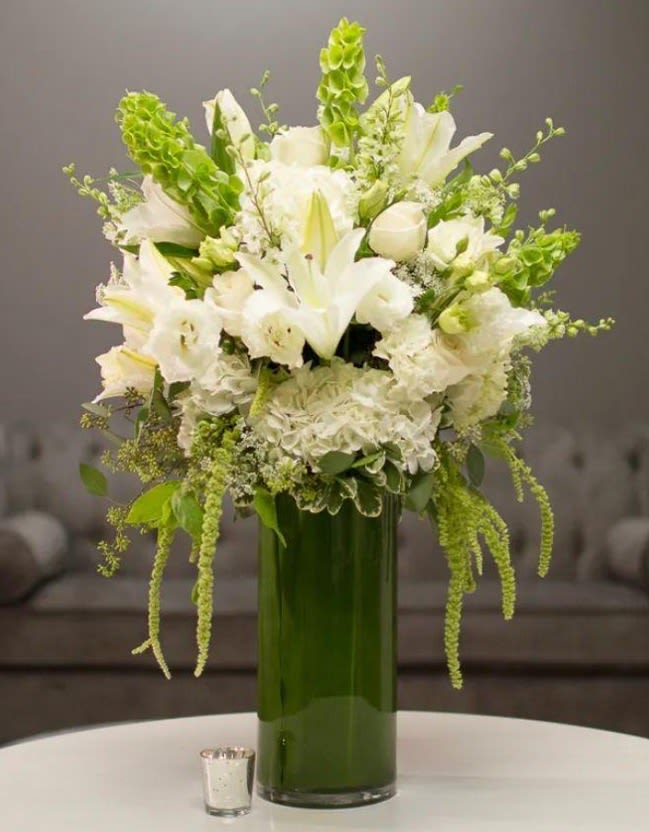 White and Green floral arrangement in a tall vase - White and Green floral arrangement in a tall vase