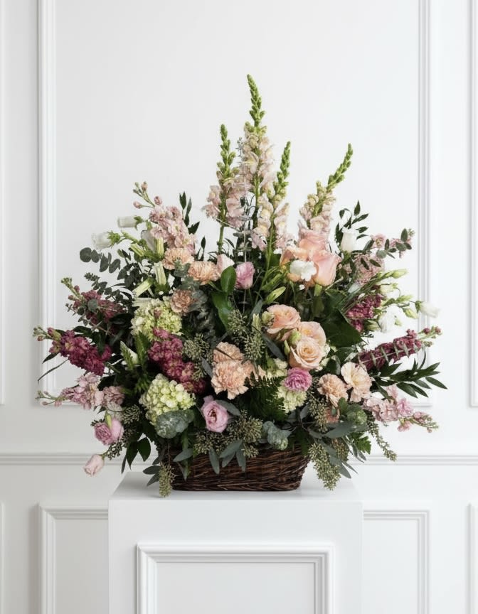 Vintage Pastel Sympathy Expressions - Celebrate a life beautifully lived with the timeless elegance of our Vintage Pastel Sympathy Expressions arrangement. Featuring a serene blend of spring garden snapdragons, graceful lisianthus, and lush hydrangeas, this tribute captures the essence of peace and remembrance. Perfectly designed to honor your loved one.   Option shown is the deluxe size.   Also available in other color schemes, please inquire. 