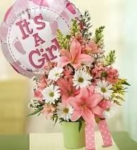 Florist Choice Its A Girl - A sweet and joyful arrangement designed to celebrate a new baby girl. This florist’s choice bouquet features a beautiful mix of fresh pink and white blooms, thoughtfully selected for quality and seasonal availability. Accented with lush greens and paired with a festive “It’s a Girl” balloon, this charming arrangement is the perfect way to welcome a little one with love and happiness.