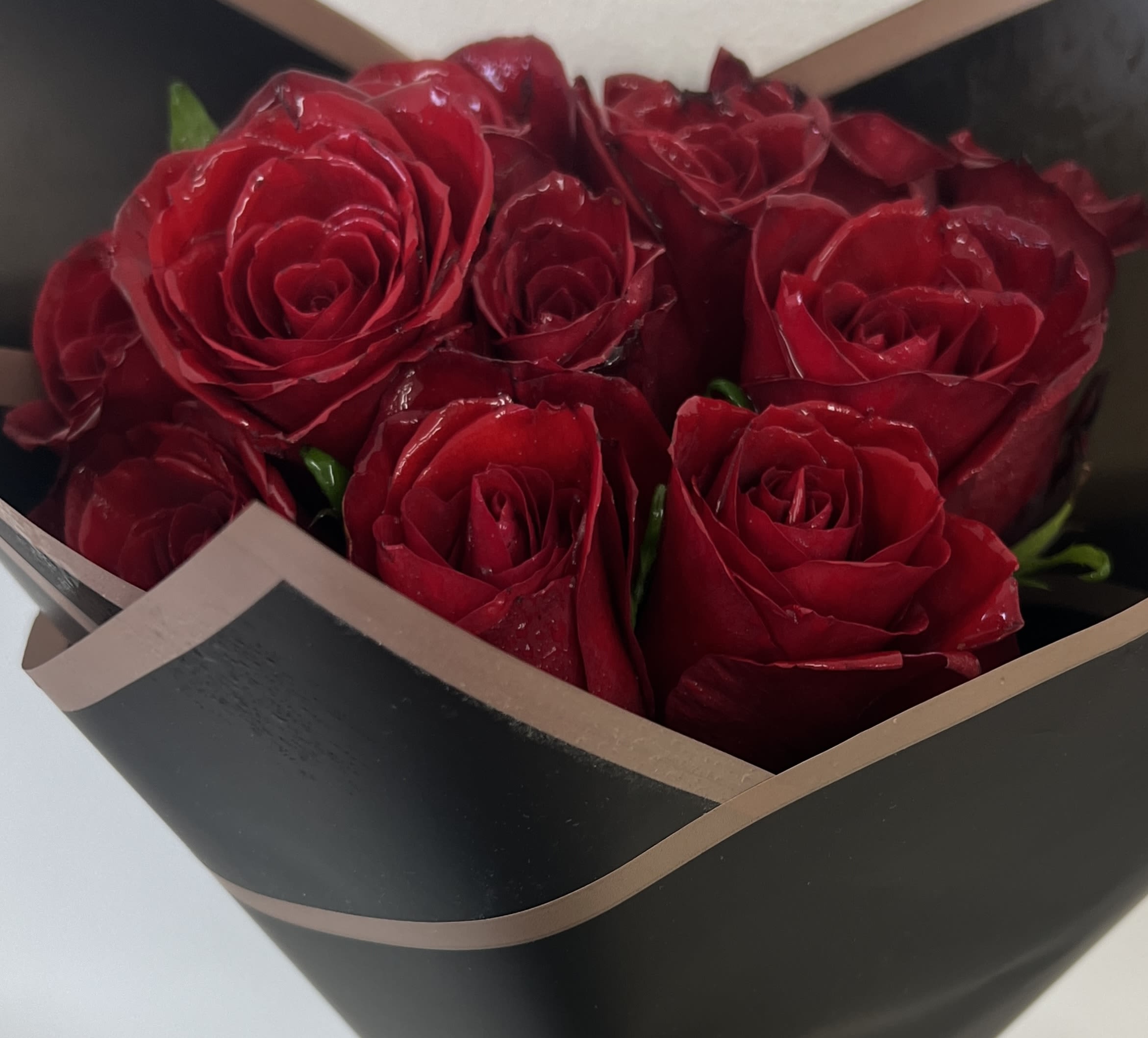 12 red roses (wrapped bouquet) - 12 red roses wrapped in black floral paper - florist La Habra CA