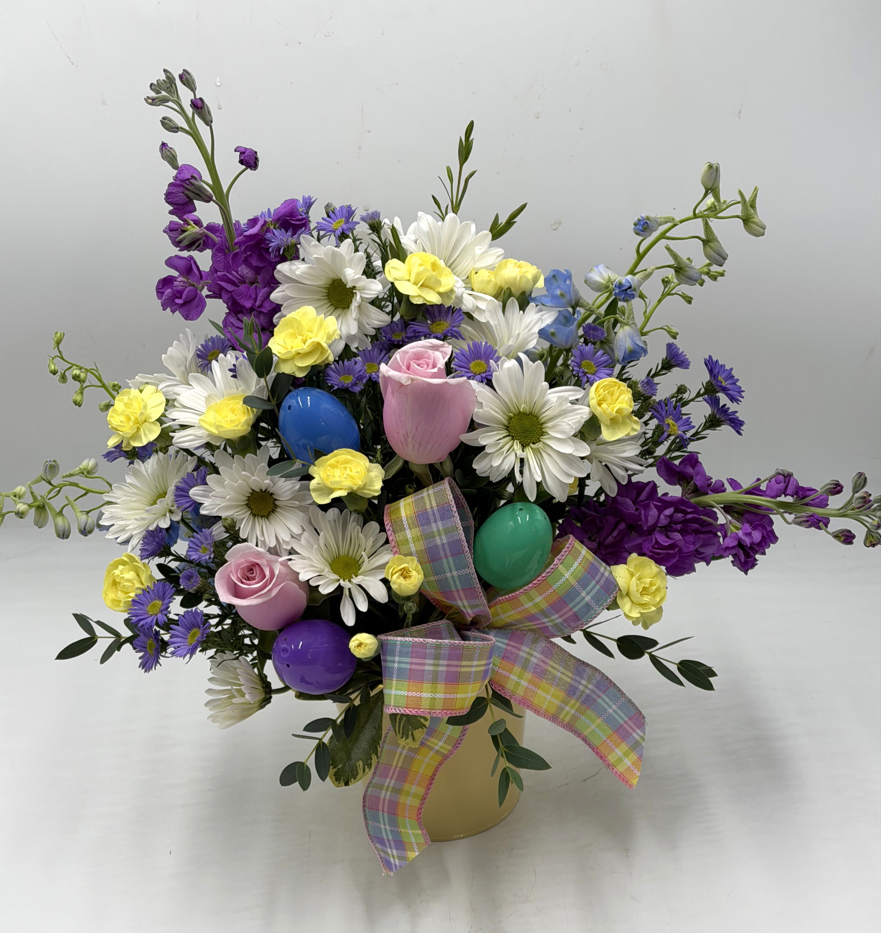 Springtime Egg Hung Garden - This garden-inspired arrangement bursts with fresh color and playful charm. Perfect for Easter Gatherings, seasonal gifting or adding a touch of happiness to any space!