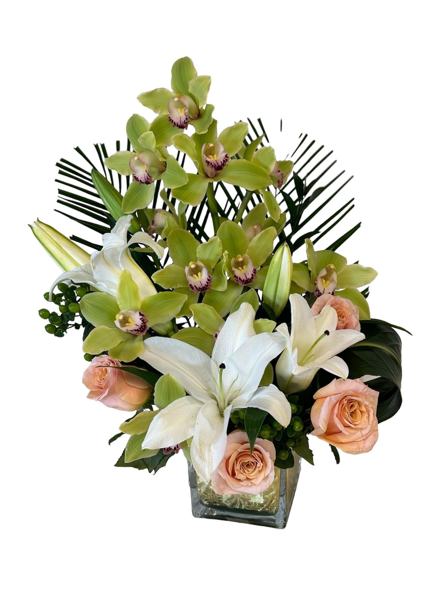 Orchid Oasis Elegance - This Style Flower Arrangement is perfect for any occasion, whether it's a birthday, anniversary, graduation, or just a thoughtful gesture to brighten someone's day. Its luxurious combination of green cymbidium orchids, exotic greenery, white lilies, and peach roses makes it a versatile and exquisite gift choice that will surely delight the recipient.