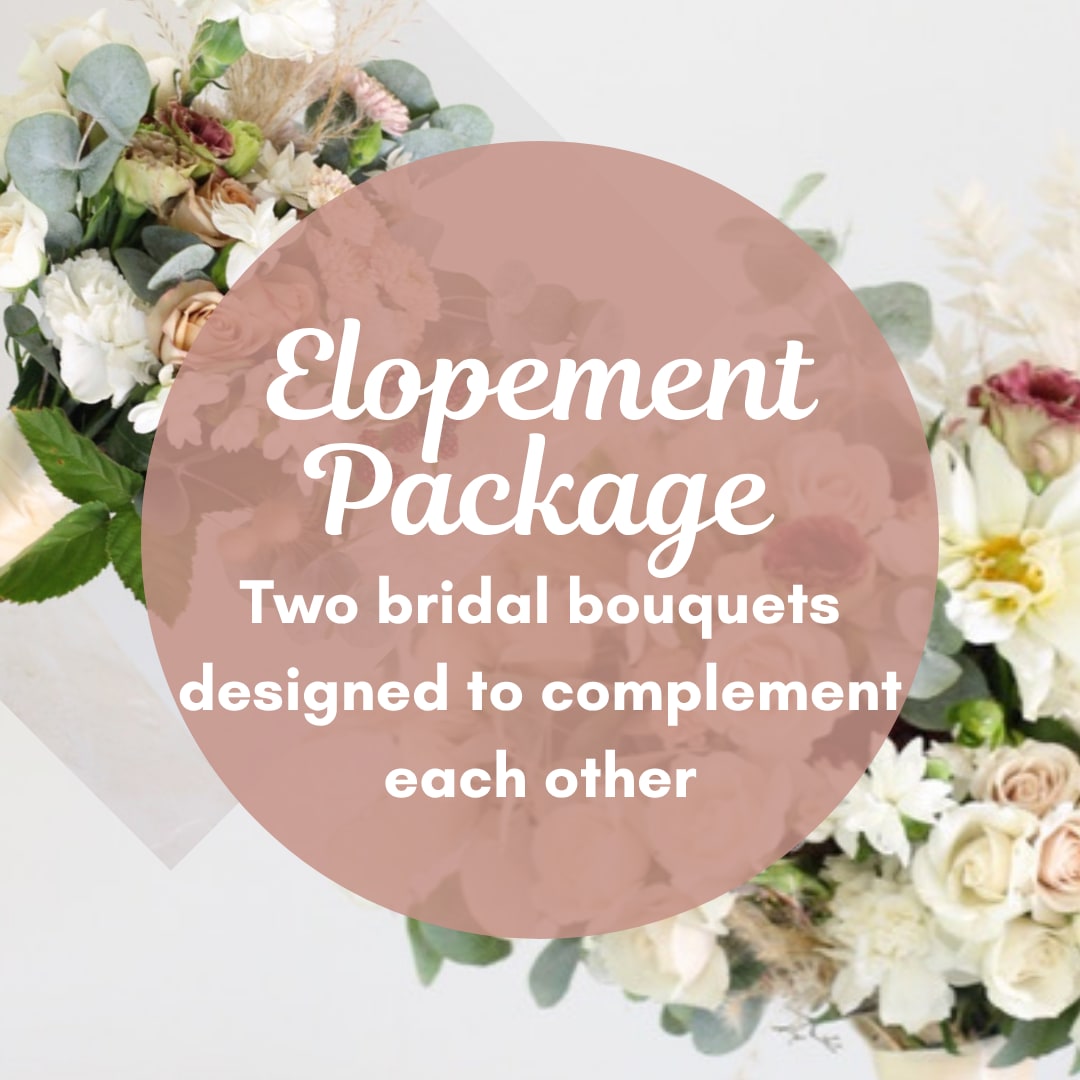 Elopement Package: Two Bouquets - Two ribbon-wrapped bridal bouquets designed to complement each other. Please specify if you would like your bouquets to be the same size or one larger and one smaller.  Let us know what color palette you'd like as well as your ribbon color.   For specific flower requests, call us or choose deluxe or premium package.