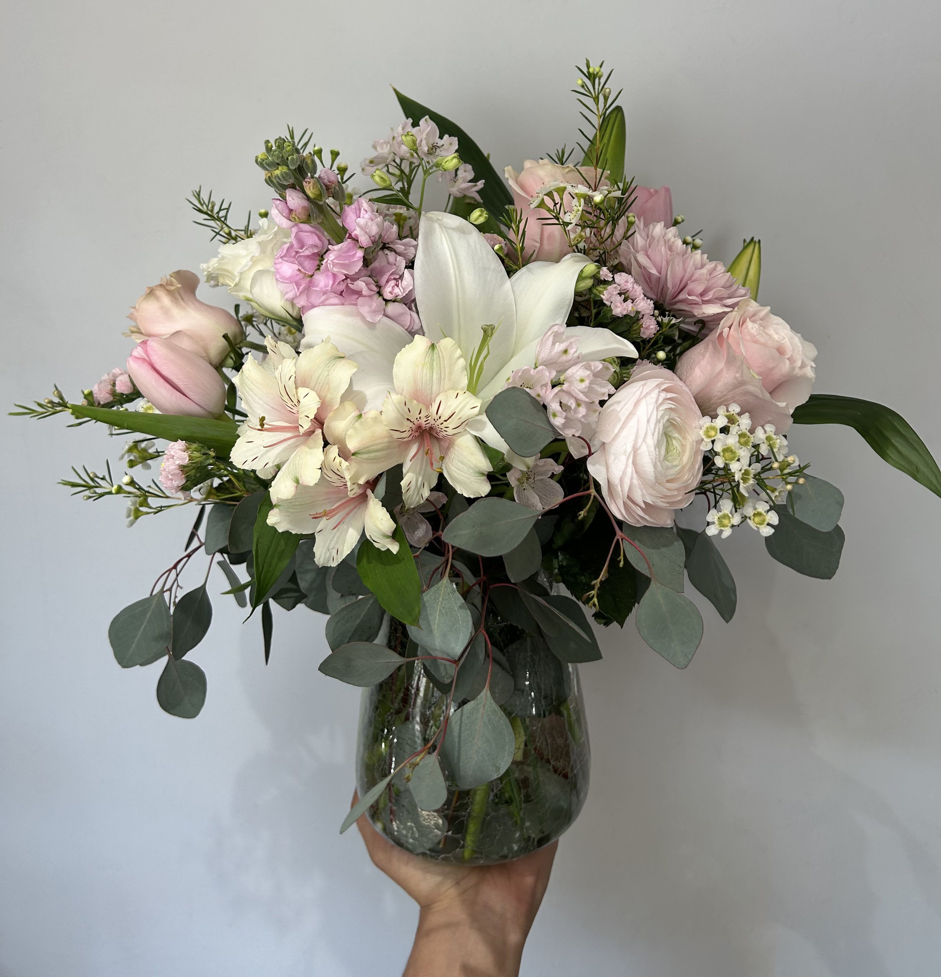 Pink Mist - Seasonal light pinks and whites arranged into a vase with filler and greenery