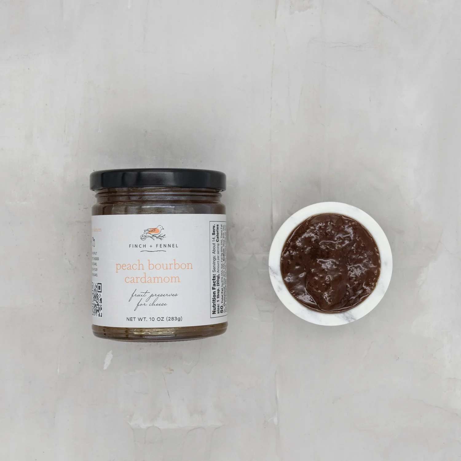 Finch + Fennel 10 oz. Peach Bourbon Cardamom Fruit Preserves for Cheese - Peach Bourbon Cardamom Fruit Preserves for Cheese. Perfectly pair this fruit preserve with soft cheeses like Brie, Saint Nectaire, blue, or Chevre on your next charcuterie board.