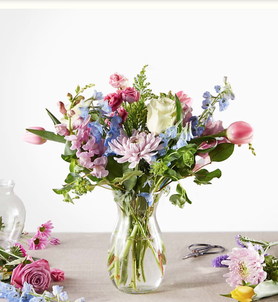 Shakermaker - tulips, roses, lark/stock, queens in a glass vase  *similar substitutions depending on inventory 