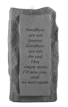 Rectangular memorial stone with engraved sympathy verse on rough rock background