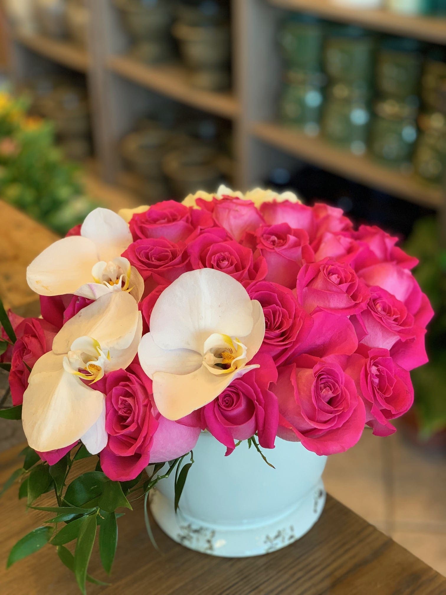 Bubblegum Madness - Beautiful and stunning arrangement of pink roses, hydrangea and Phalaenopsis orchids 