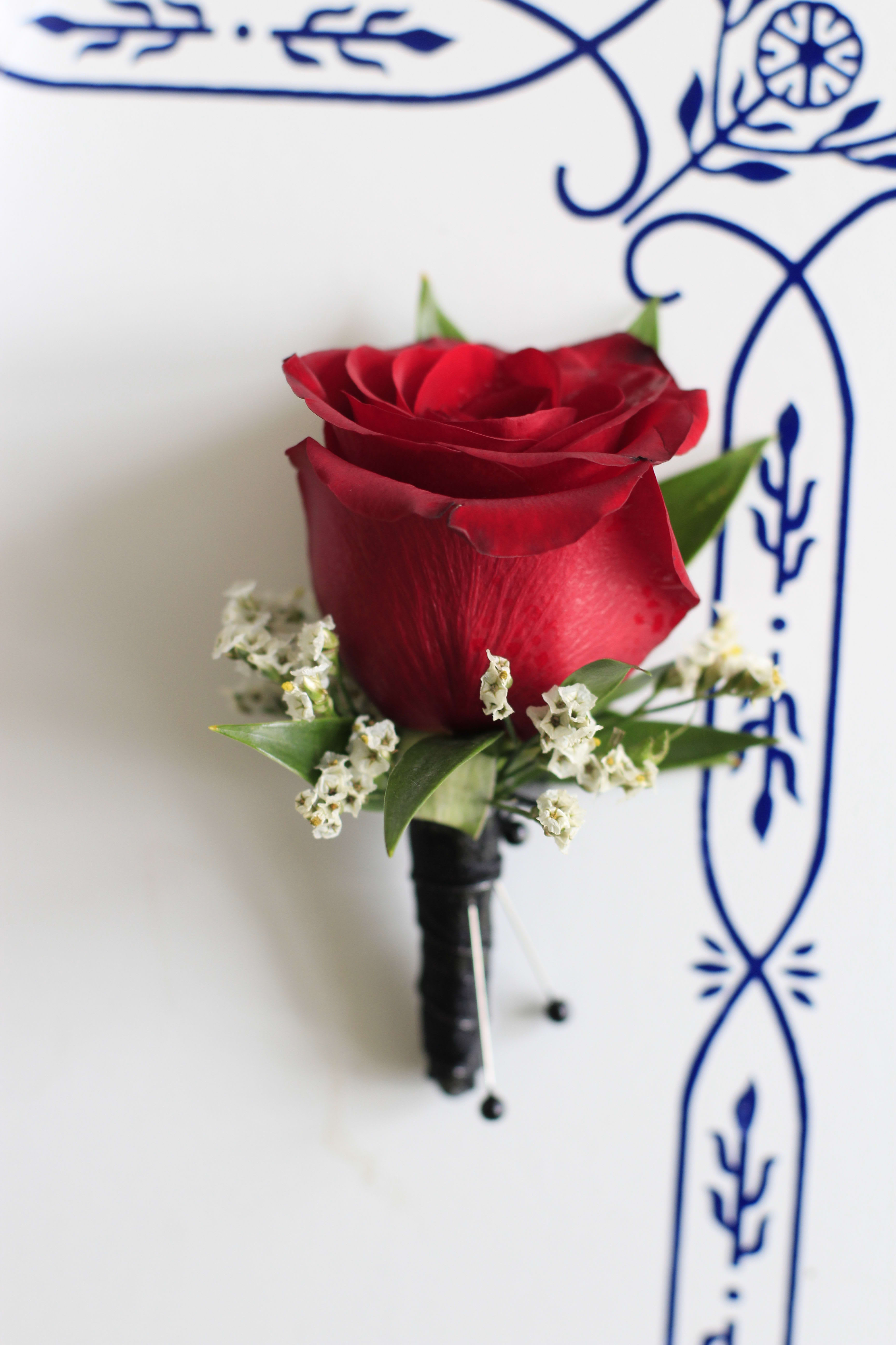 Red rose boutonniere - Classic and timeless red rose boutonniere for any special occasion.  PLEASE SPECIFY STEM WRAP COLOR IN SPECIAL INSTRUCTIONS.  COLORS AVAILABLE ARE BLACK, WHITE, LIGHT PINK, GOLD, SILVER OR IVORY.  CALL FOR OTHER COLOR OPTIONS