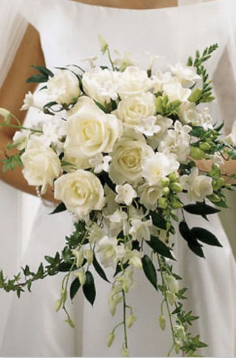  Elegant Romance  - An all white stunning bouquet filled with roses, freesias, orchids and stephanotis to give it that beautiful elegant romance.   Disclaimer: Flowers may be replaced if needed to. 