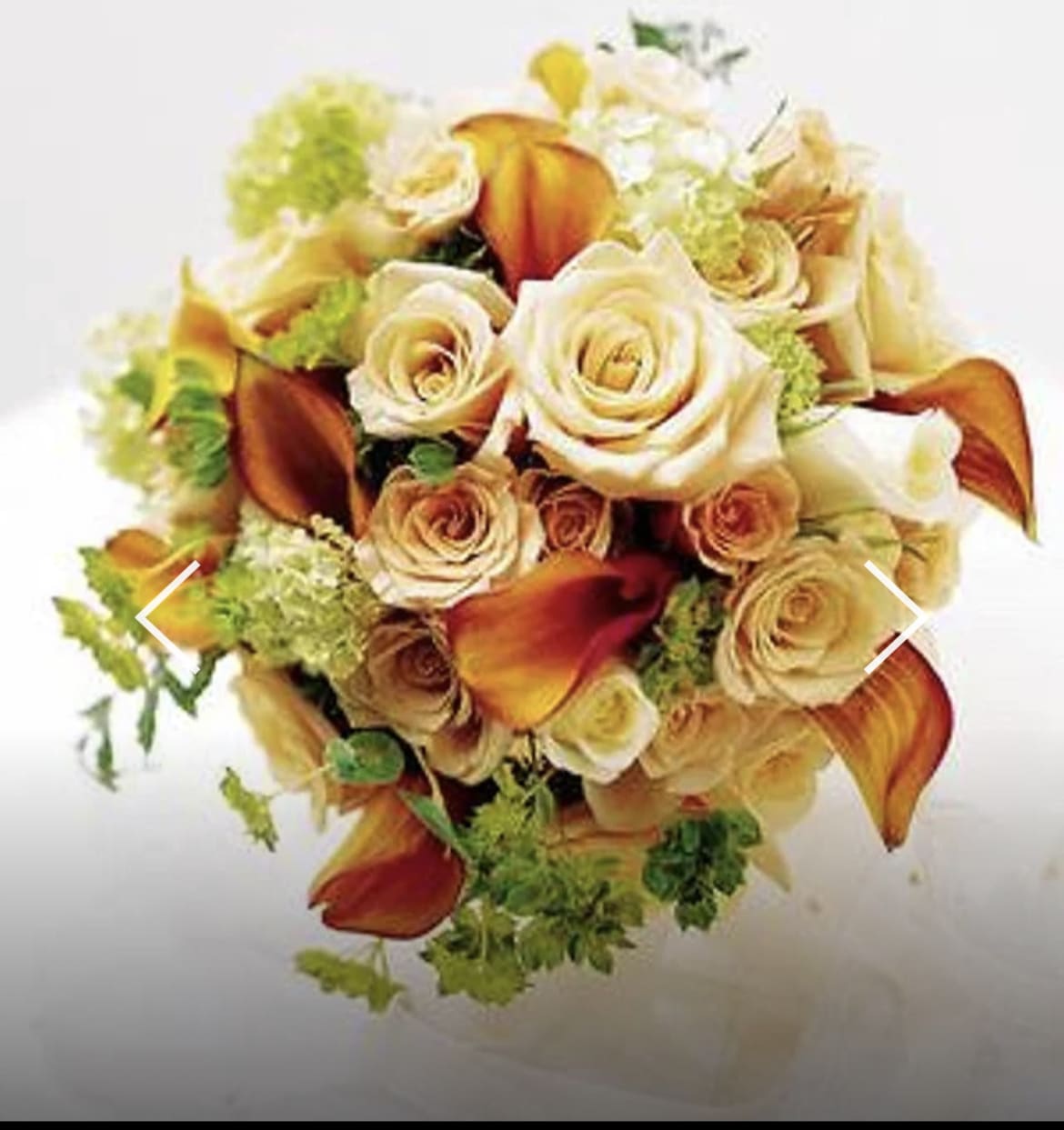 Peach Dream  - A wonderful mix of peach and orange flowers, being roses and calla lilies and a couple spray roses making it a stunning peach dream. 