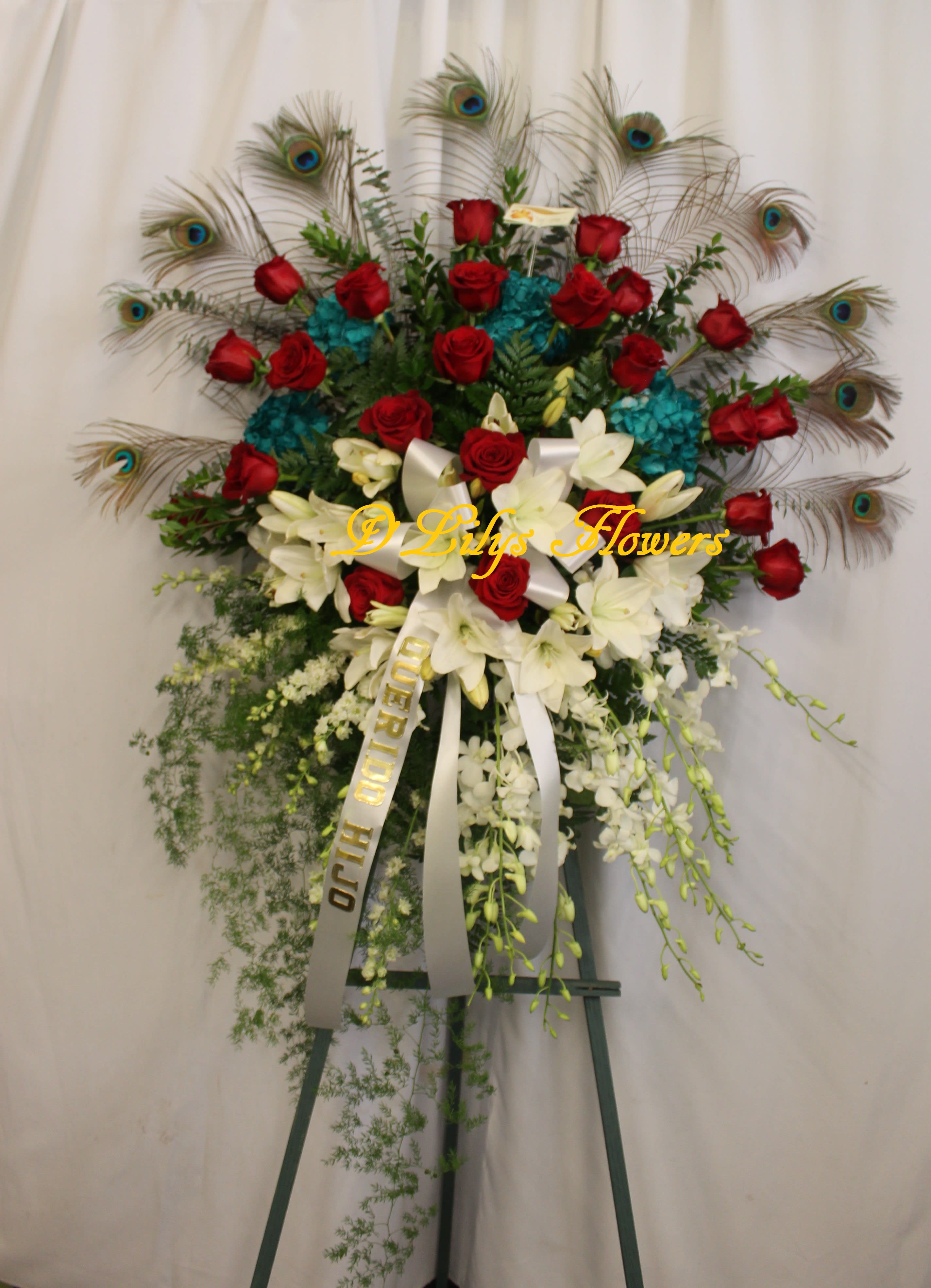 Peacock Feather - Everything can be made at D'lily's with creativity. DOES NOT INCLUDE RIBBON