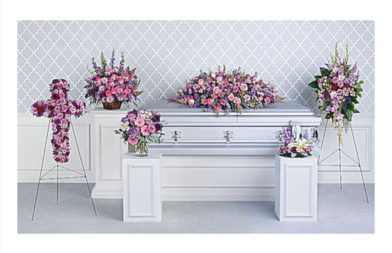 Lavender Collection - A tender tribute to your beloved, this lovely lavender collection of six hand-made sympathy pieces features a variety of beautiful blooms to brighten any life celebration. Consists of a sympathy cross, casket, standing spray, basket, and two sympathy arrangement.
