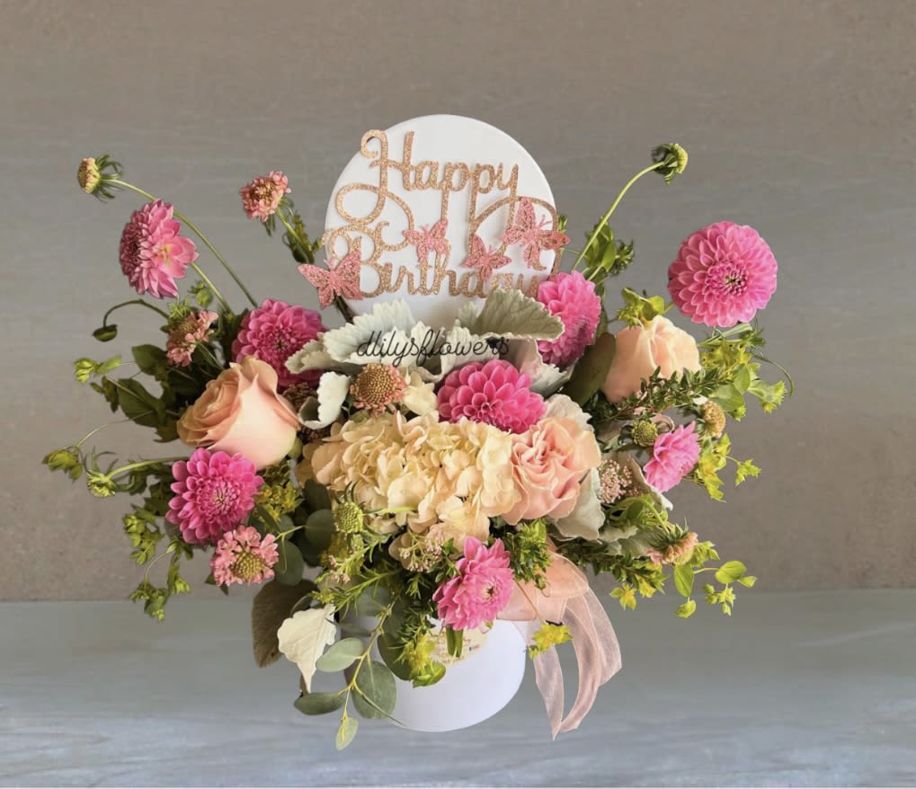 Birthday Dream by D'Lily's Flowers  - This wonderful mix of flowers is a great gift idea to give out to that special birthday person! Make there day with this beautiful mix flower box! 