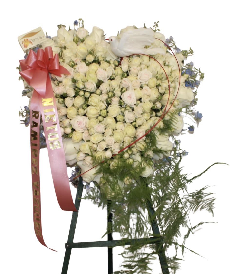 Heavenly Sent - A stunning heart in white with some baby blues for that sweet touch!                                          DOES NOT INCLUDE RIBBON