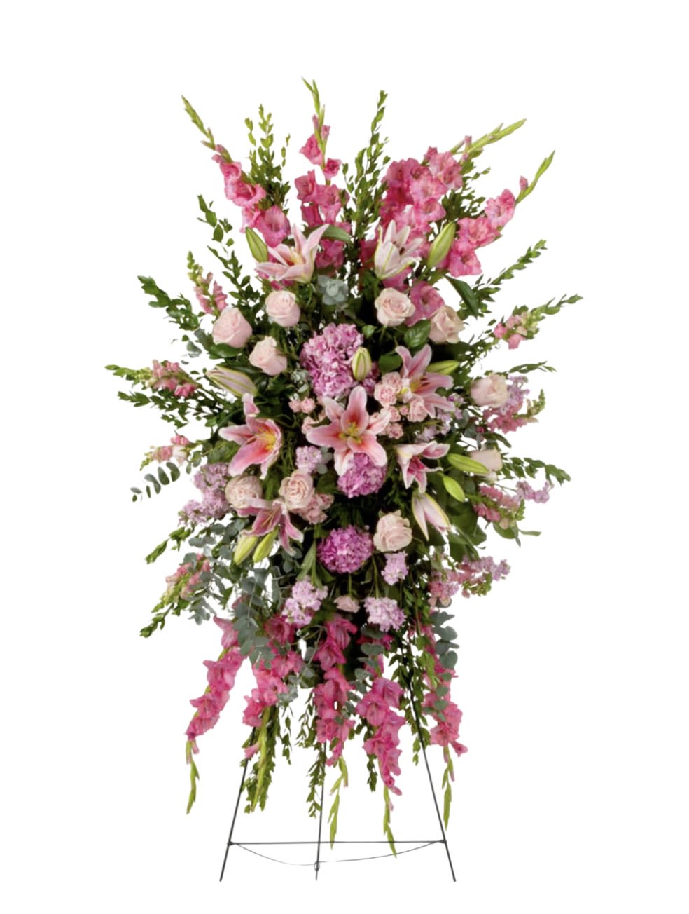 Compassion   - Pink roses, lilies, and more come together for a blushing pink standing funeral spray. 