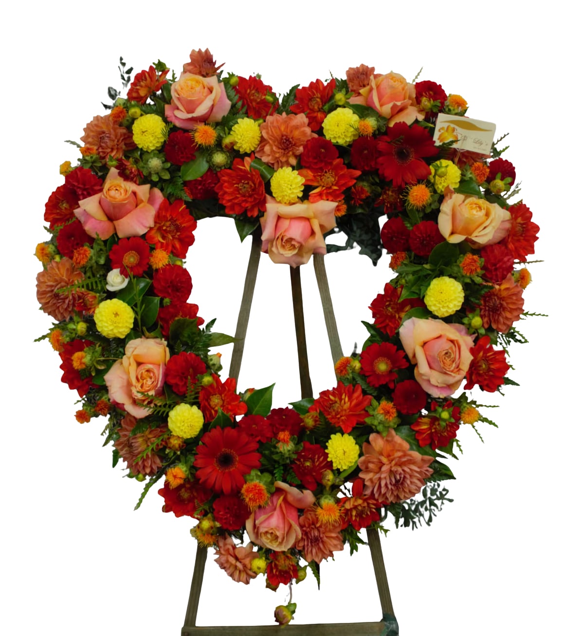 Blessed - This cross displays a graceful look in these colorful reds, yellows, and oranges along with some greenery to complete. 