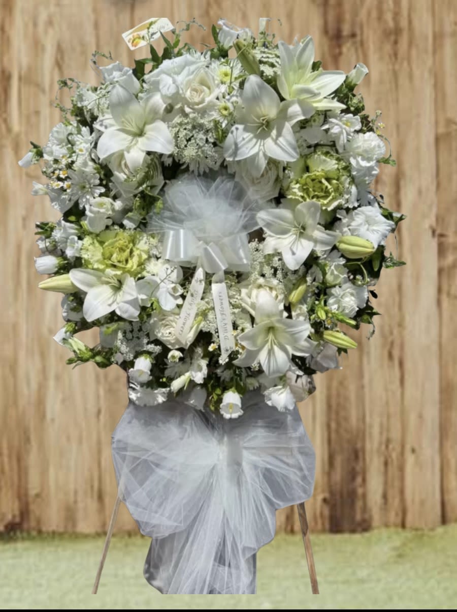 Treasured Tribute - Send your beloved with this beautifully treasured tribute, stunning all white mix florals wreath combined with a white bow.