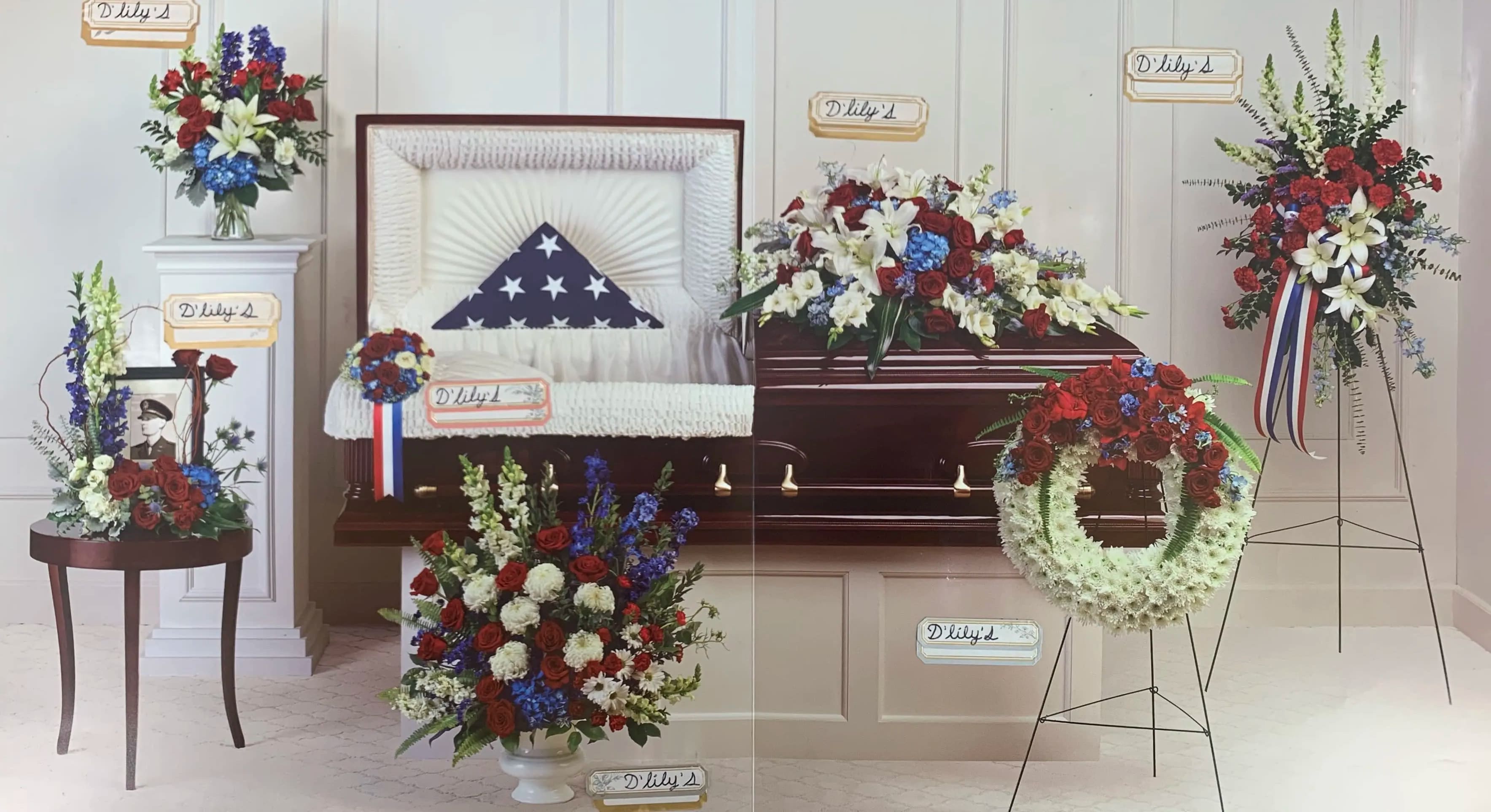 Red, White and Blue Set  - A beautiful red, white, and blue collection that consists in a sympathy wreath, standing spray, casket, and 3 stunning floral arrangements. 