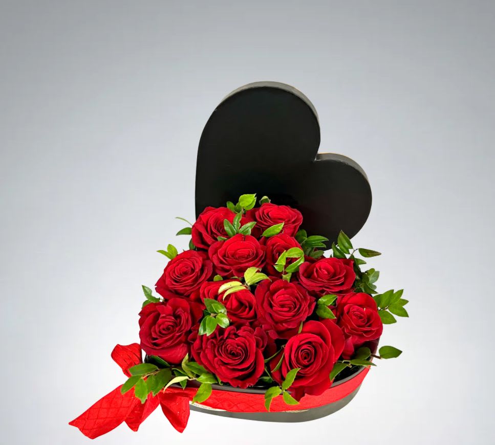 Love Surprise  by D'Lily's Flowers  - This beautiful red surprise shown above holds 1 dozen red roses. 