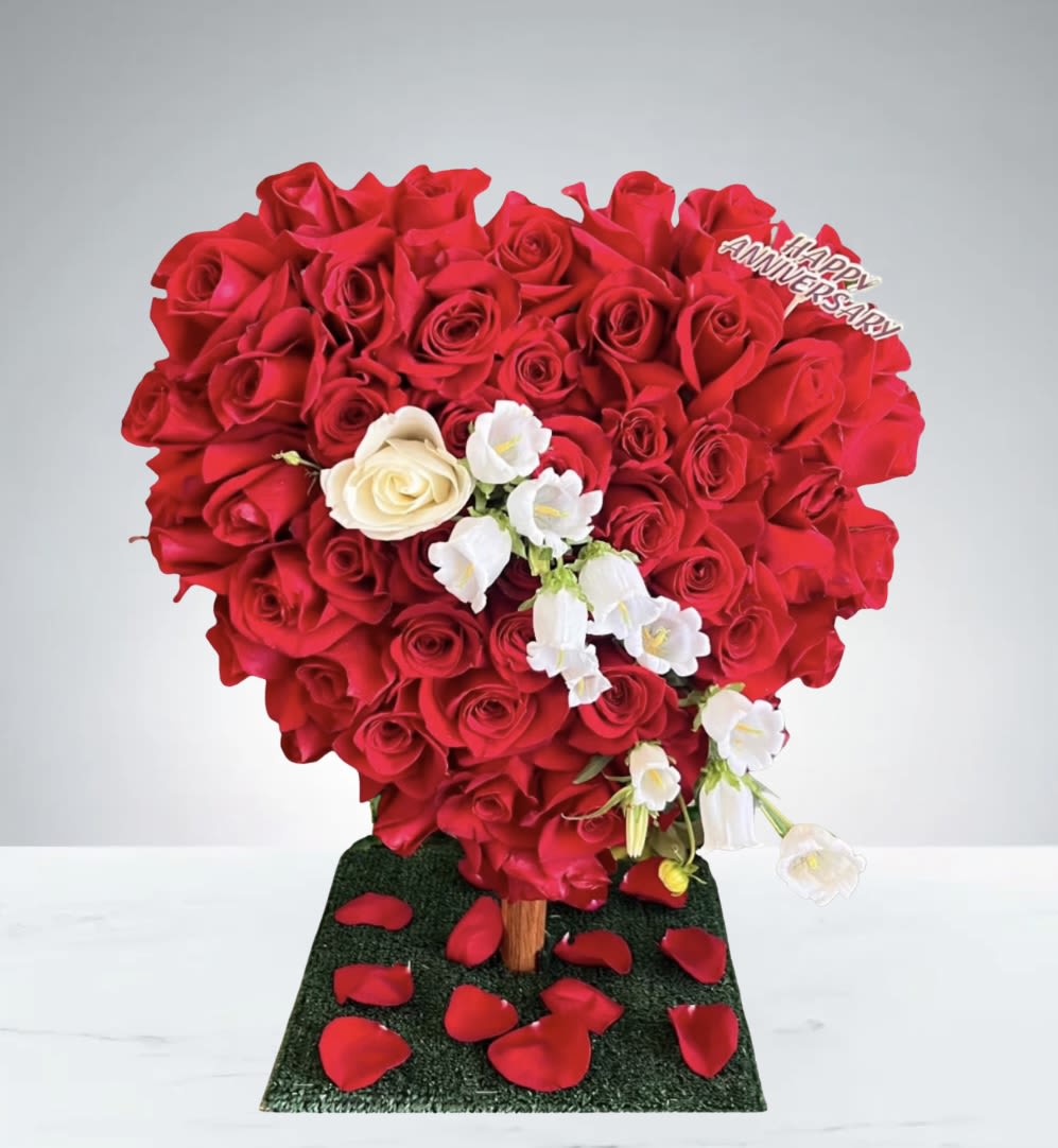 Rose Heart  by D'Lily's Flowers  - This stunning design has 4 dozen red roses, a grand gesture to show a special someone that you love them.