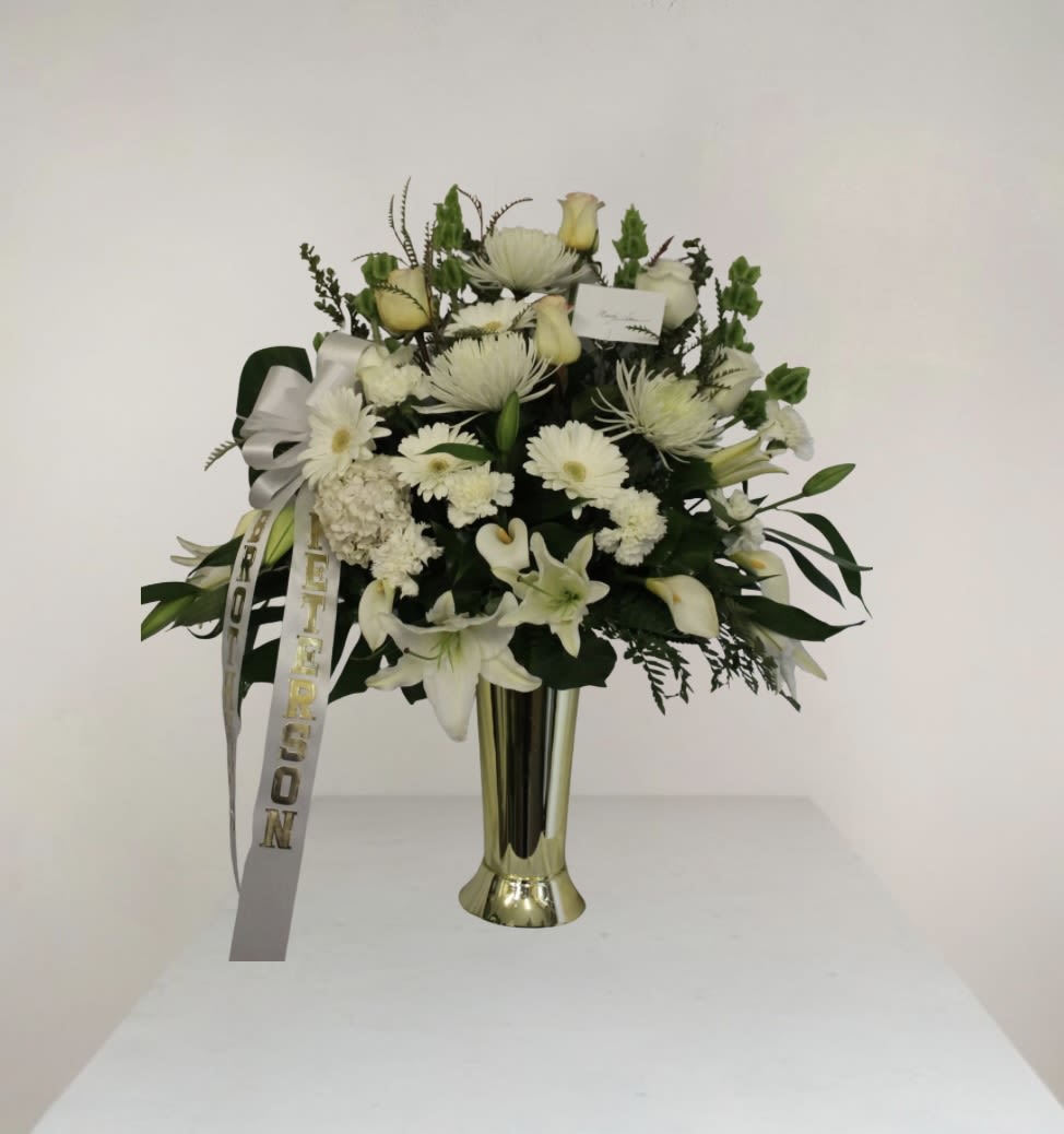 Gentle Soul - An elegant look to this all white with greenery floral arrangement.                                          DOES NOT INCLUDE RIBBON