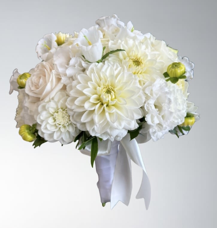 Captivating - This is a romantic pink hue bridal bouquet perfect for that special sweet day.