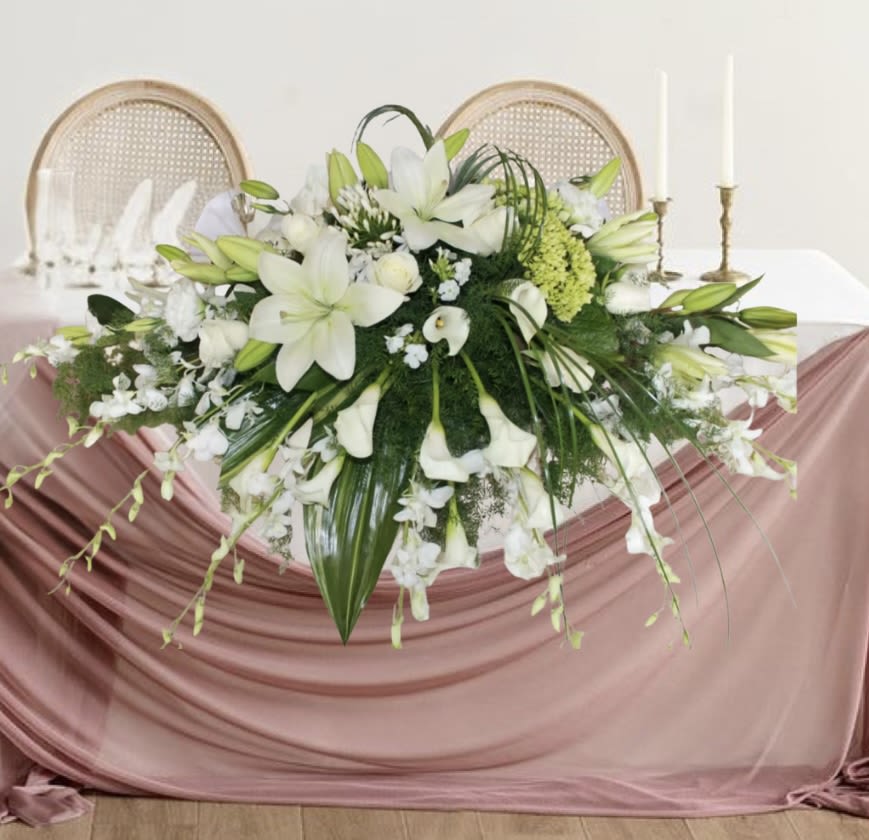 Lovely White - Lovely floral arrangement for any occasion in whites and greens.