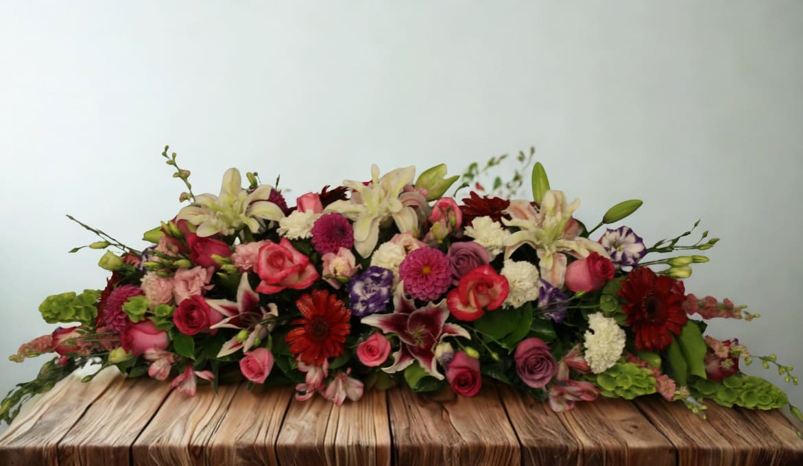 Whimsical - Lovely floral arrangement in a variety of colors.