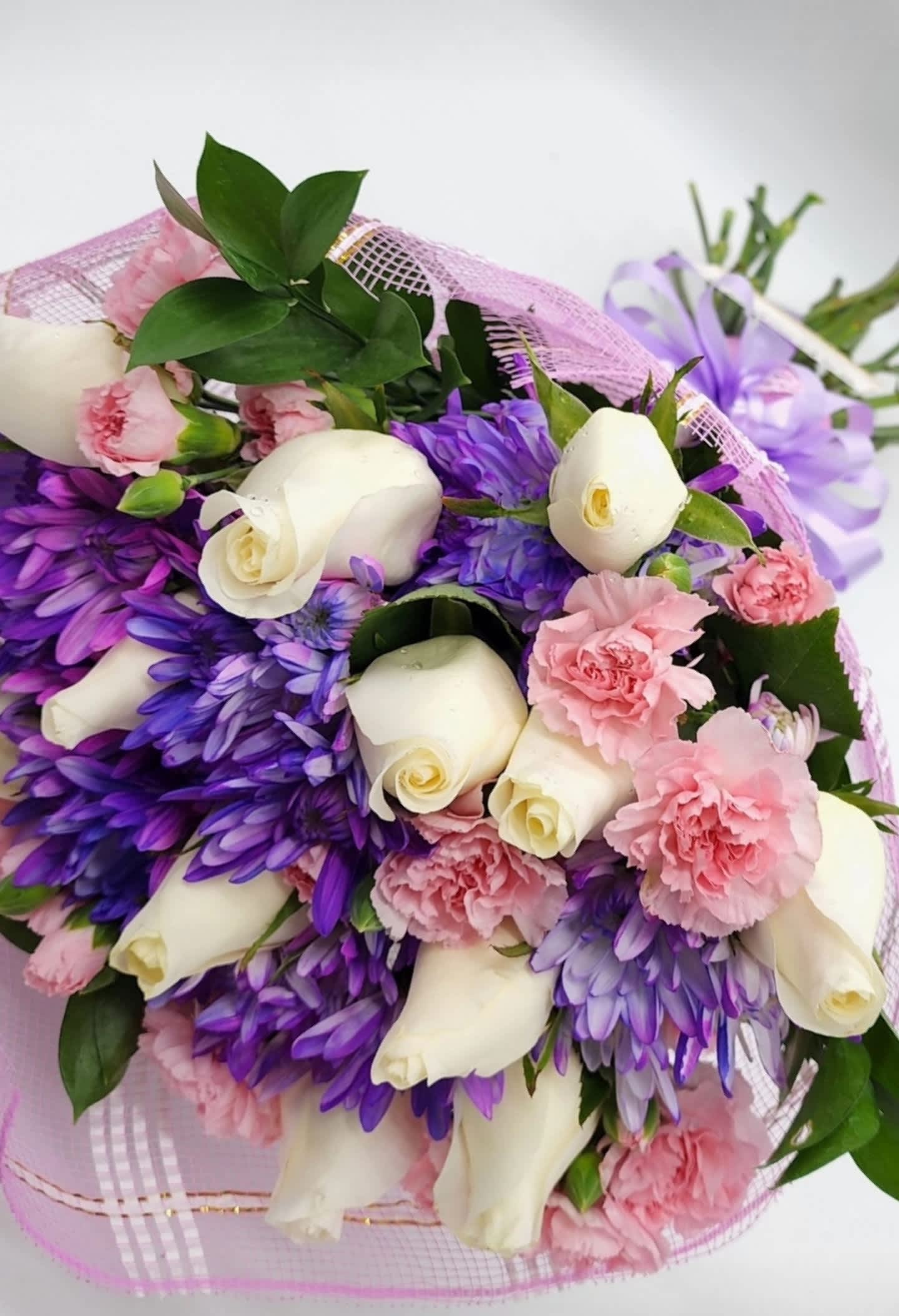 "Cloud Nine" Love Bouquet  - A Beautiful Bouquet for that special someone! Twelve White Roses, mixed with designers choice spring flowers!