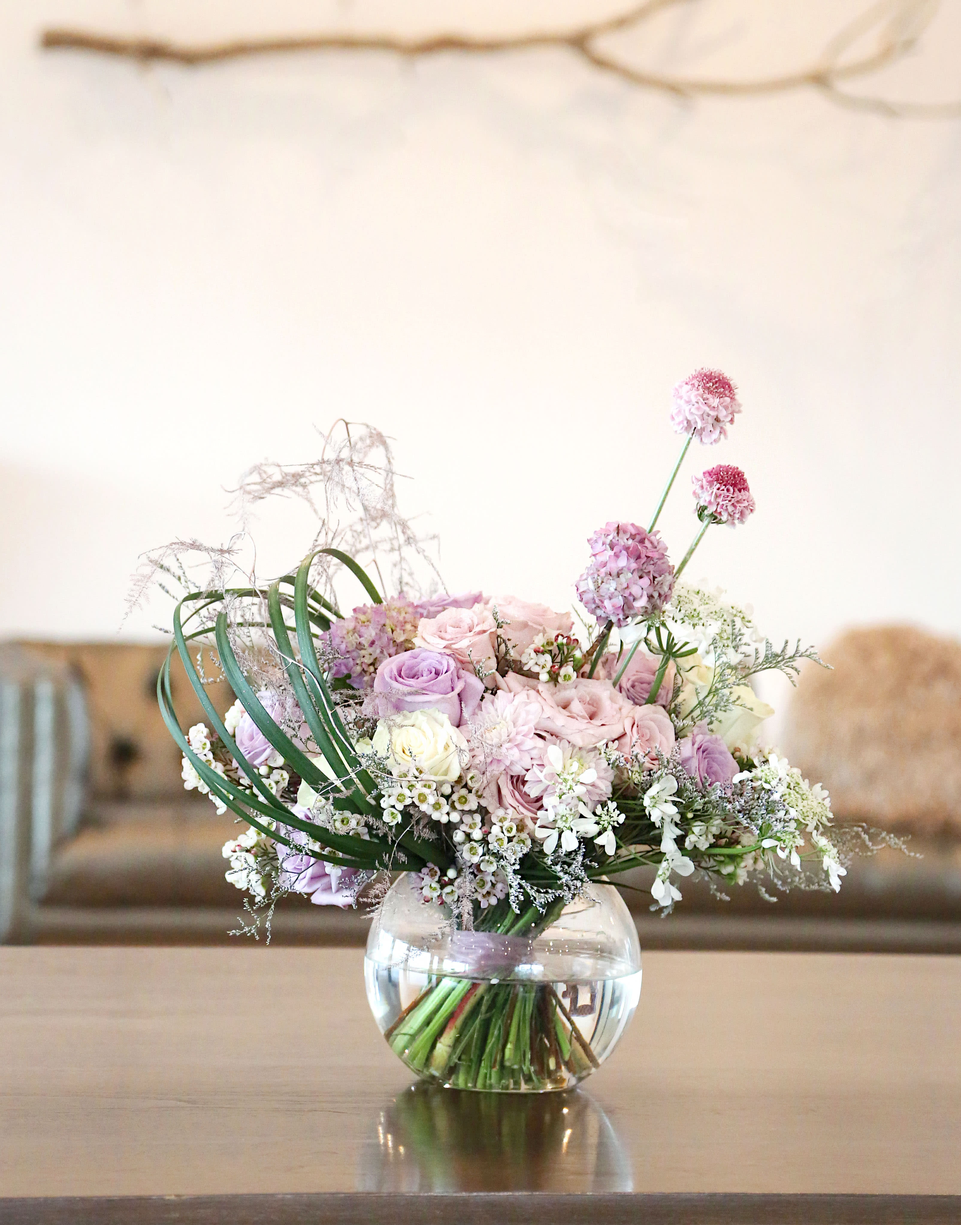 Lavender Romance rose garden - A romantic Lavender and Ivory fragrant garden rose with seasonal bloom with Lilly leaf heart shape decor Perfect gifts for the one you love. This hand-tie ribbon wrap bouquet perfect  in 8" round vase and it will delivered with gift box with greeting card