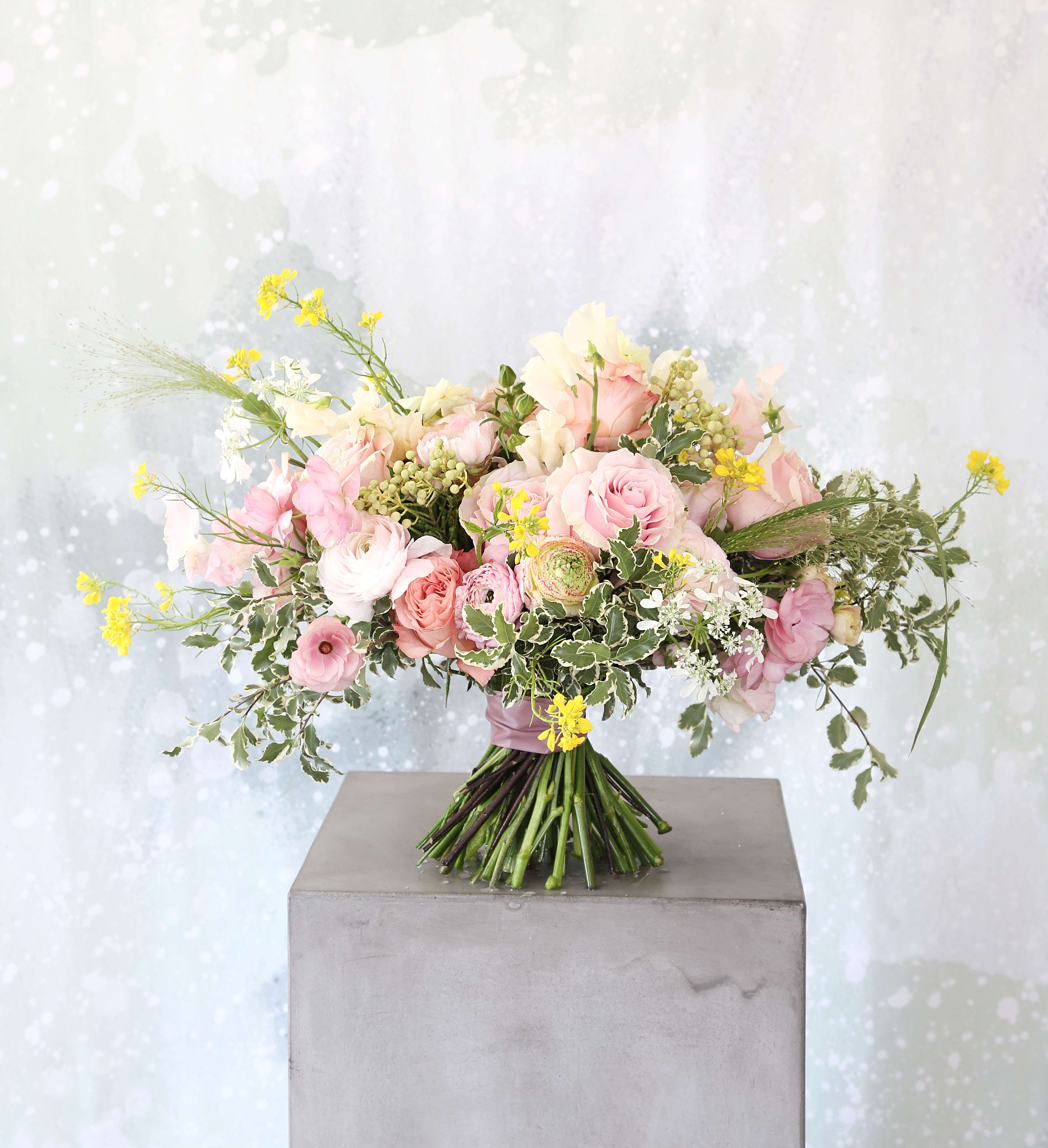 Pink Romance - A fan shape hand tie bouquet create with soft pink, pastel color premium bloom - blush Garden rose, ranunculus, Lisianthus, Japanese fragrant sweet pea in 8" round vase. This arrangement delivers with gift box and card.