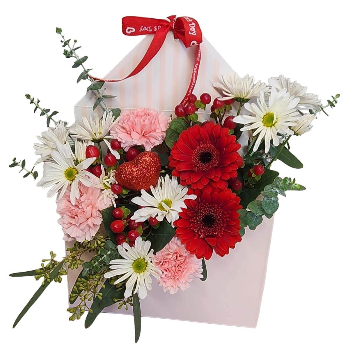 Envelope-shaped pink box filled with red gerbera daisies, white daisies, pink carnations, and a red glitter heart pick.