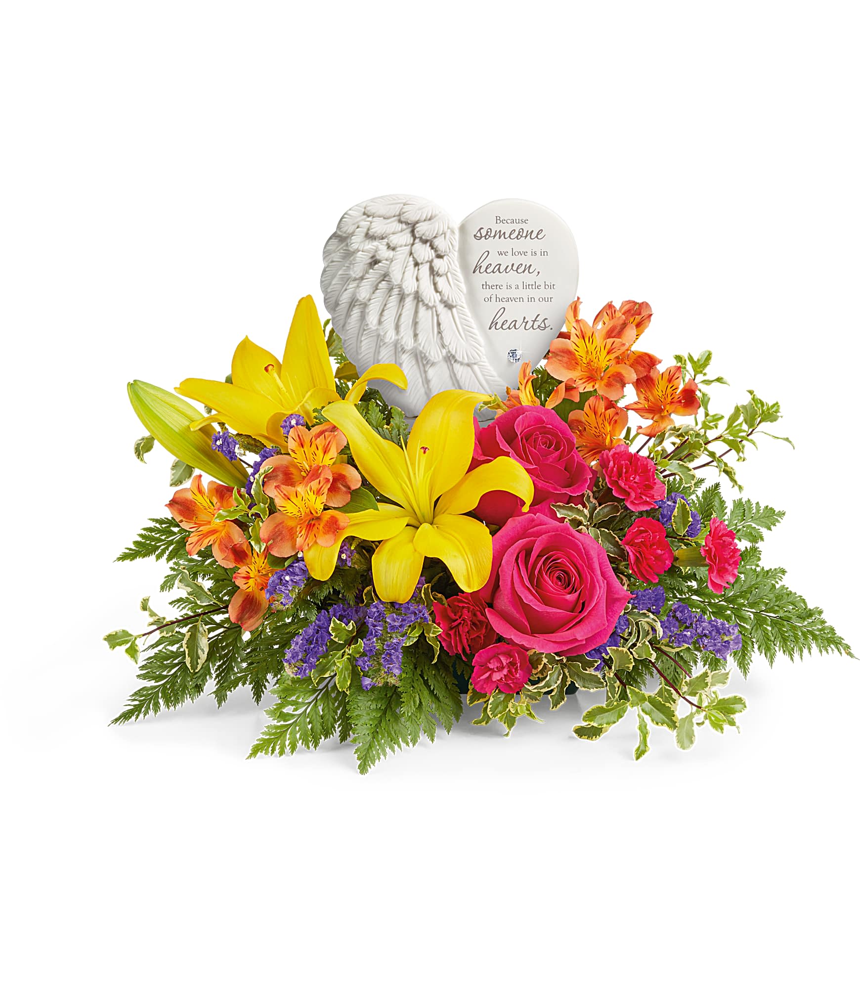 Forever In Bloom Bouquet - A heartfelt tribute to a cherished life, this stunning arrangement of vibrant blooms beautifully surrounds Heaven's Heart Keepsake. Featuring a delicate angel wing design, this touching porcelain keepsake offers comfort and love, making it a treasured reminder of precious memories.