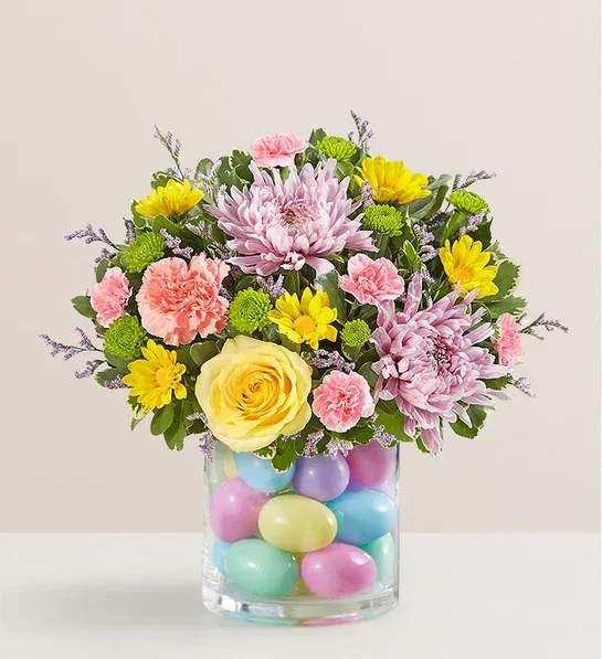 Egg-Amazing Bouquet - The hunt is over for the perfect Easter bouquet. This joyful explosion of pink, lavender and yellow is sure to light up their table this spring!