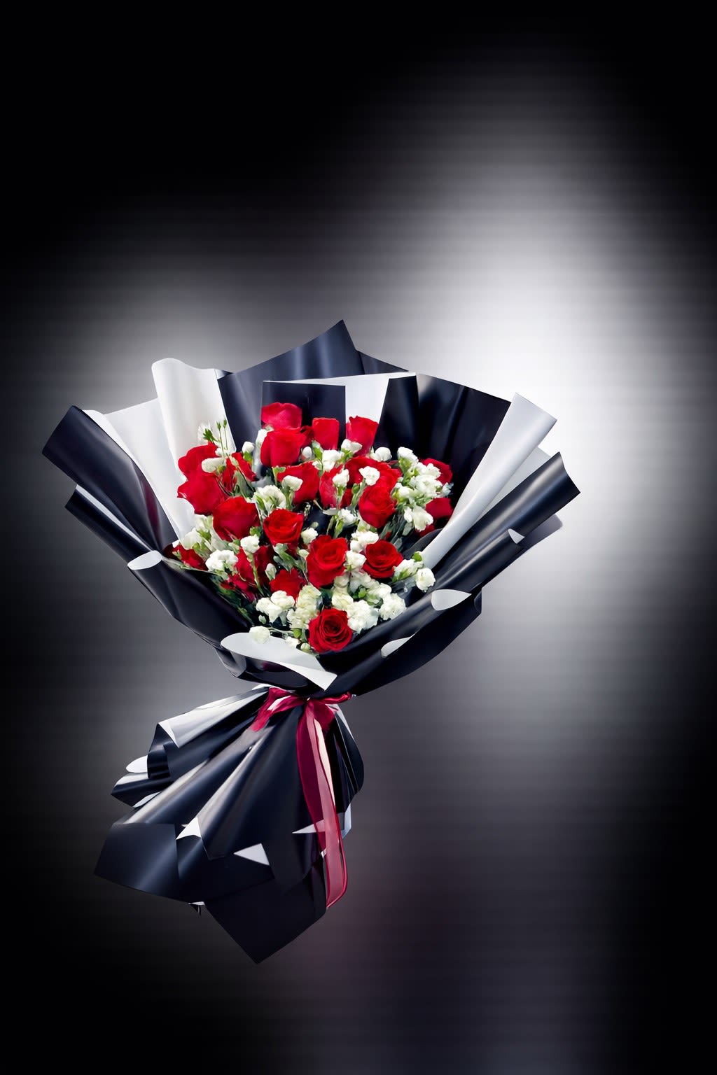 Wrapping Bouquet - Red roses and white carnations come together in a clean, elegant wrap, creating a striking contrast that feels both romantic and fresh. A beautiful choice for anniversaries, celebrations, or thoughtful gestures.