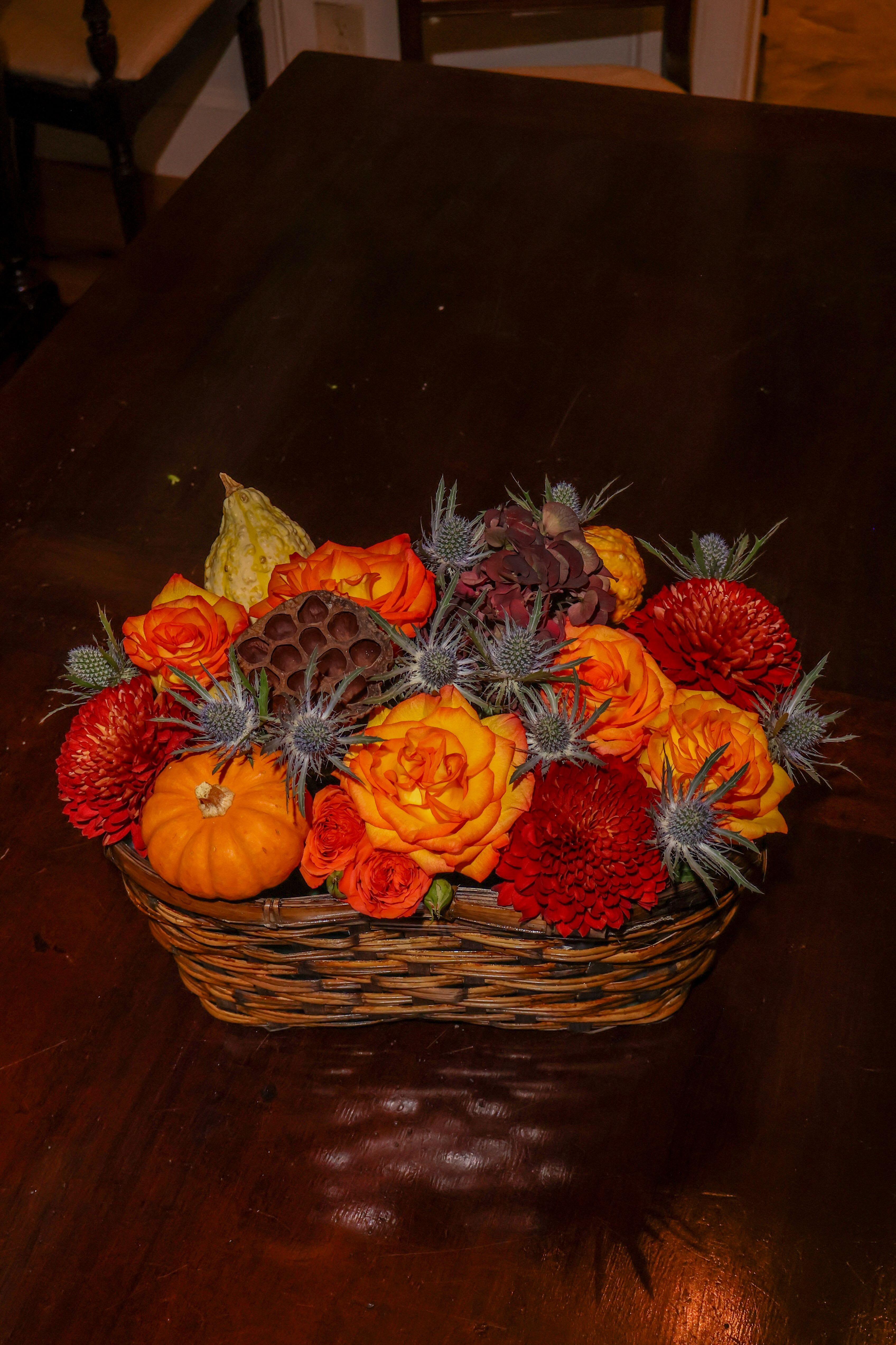 Autumn Basket - Bountiful basket, filled with roses, thistle, Lotus pods, mums, spray roses, gourds/ pumpkins. 