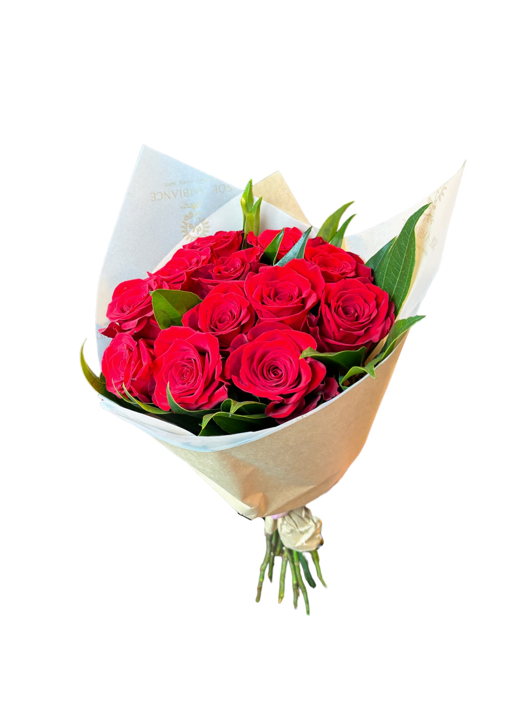 Bouquet of red roses wrapped in pale paper