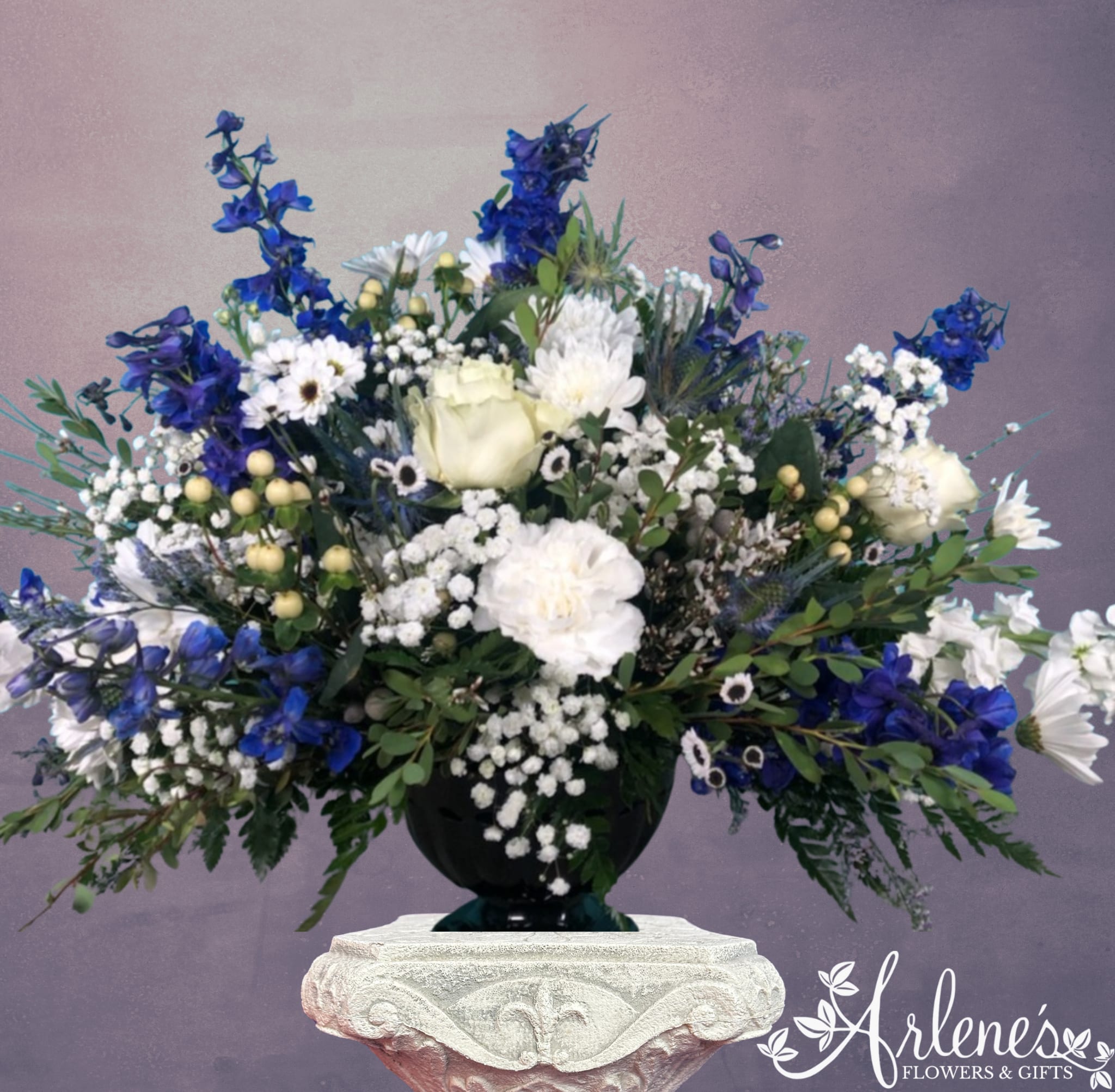 Peaceful Blues - Mix of blue and white flowers in a pedestal vase.
