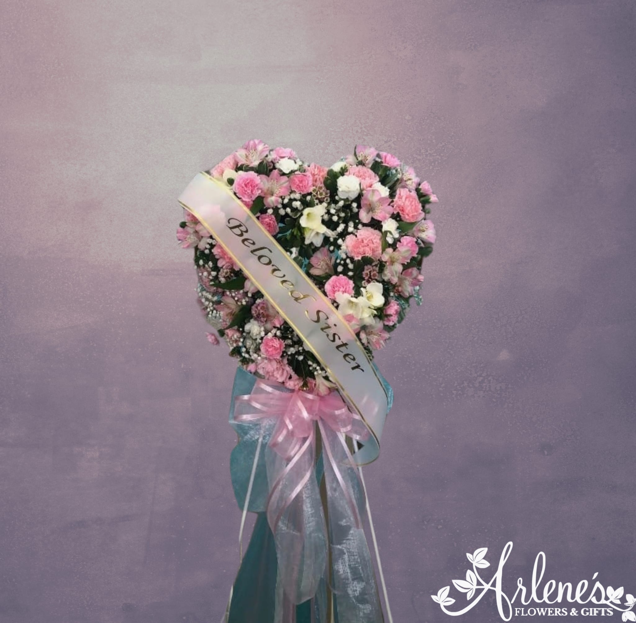 Extra Small Standing Heart Easel - Call to see if this is available for your loved one's service. We'd love to personalize with a suitable color combo and banner. 