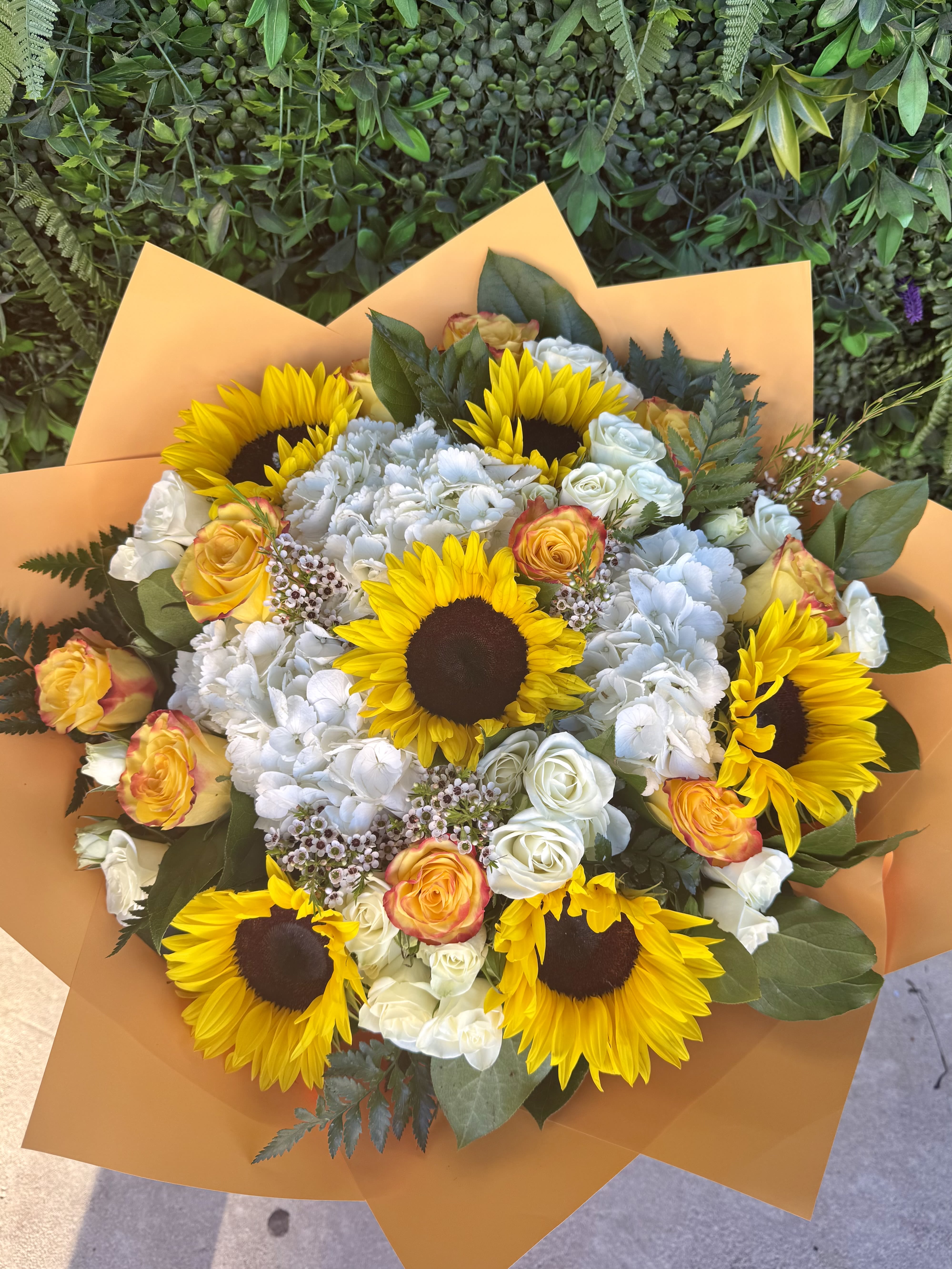 Brightness - A bright and joyful bouquet featuring sunflowers, symbolizing warmth, positivity, and happiness. With their golden petals and vibrant energy, these blooms bring a sunny, uplifting touch to any moment