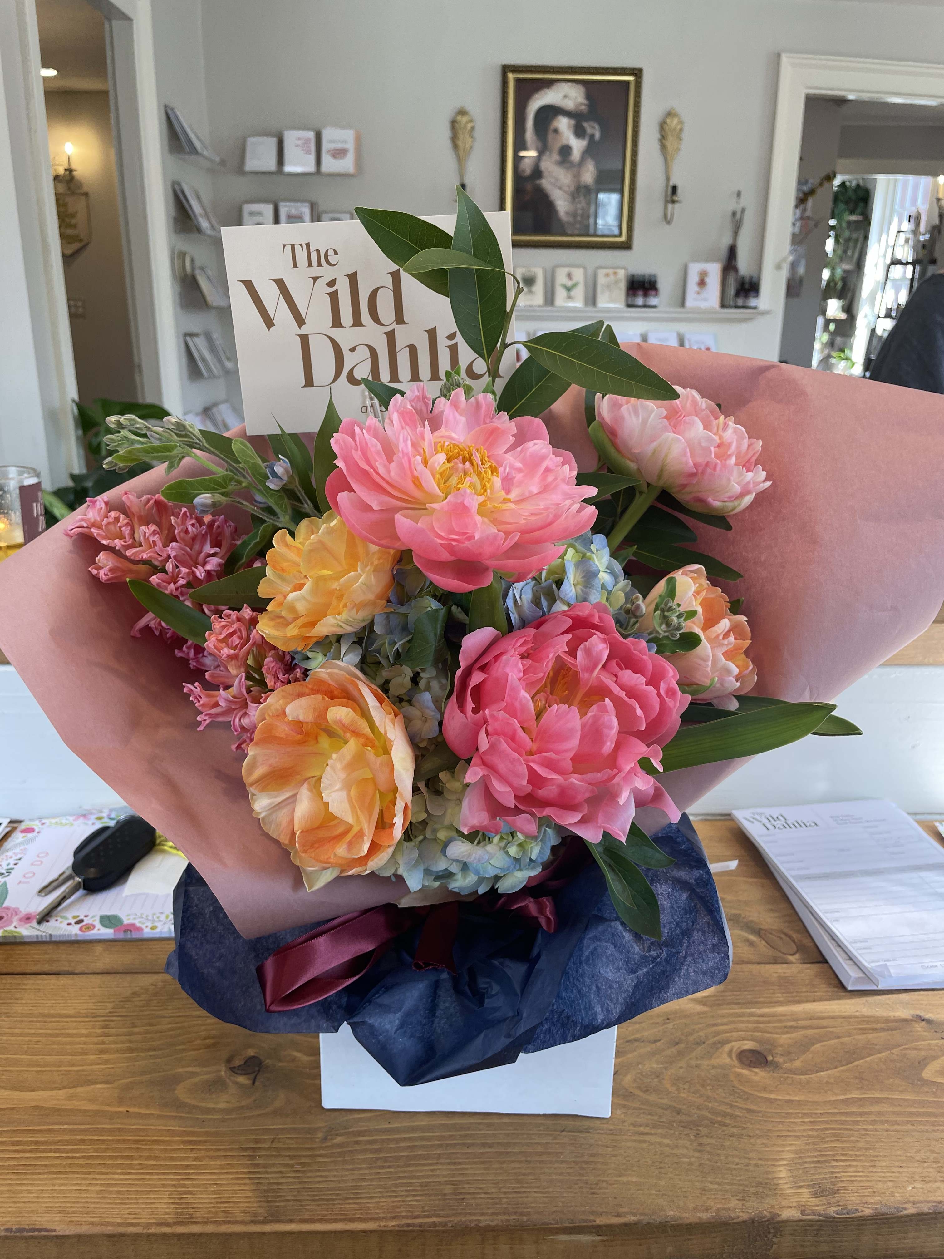 Bohemian Rhapsody - Our "Juicy Fruit" inspired design got its name from its bright and vibrant colors and the layers of petals. This bouquet features everyone's favorite seasonal bright blooms! This design is show in a bundle form, we can also make the Bohemian Rhapsody in any vase