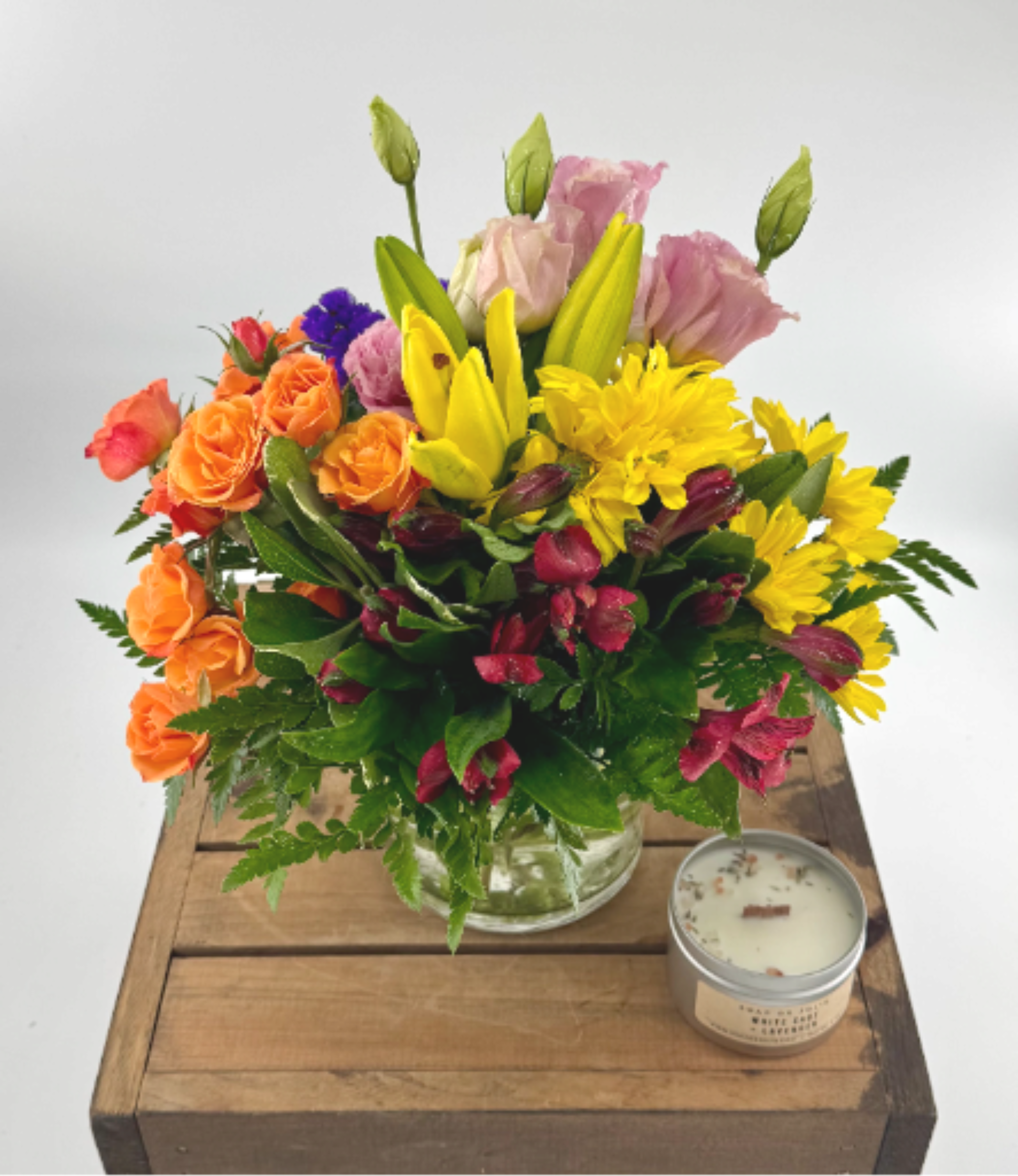 Juicy by BloomNation™ (BR) - Juicy by BloomNation™ packs a color punch! Featuring over 6 different flowers and greens, all in different colors, this arrangement is a great option for sending to co-workers, friends, or clients. Make a brightly colored splash.