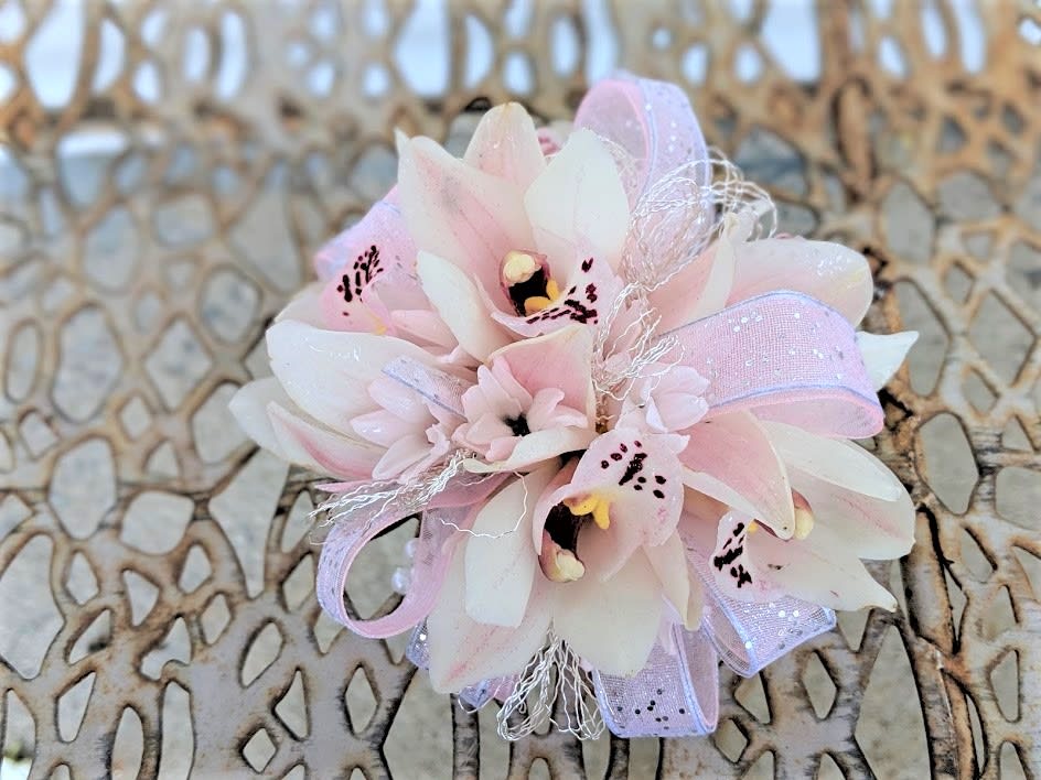 Pink &amp; Silver Cymbidium Orchid Corsage  - Shown as Standard Pink cymbidiums, hyacinth and accenting silver wire come designed on a pearl wristlet. *We custom design this arrangement and use the freshest flowers available the day of delivery. The arrangement in this picture is an example of the size and style and may not feature the exact product shown.*