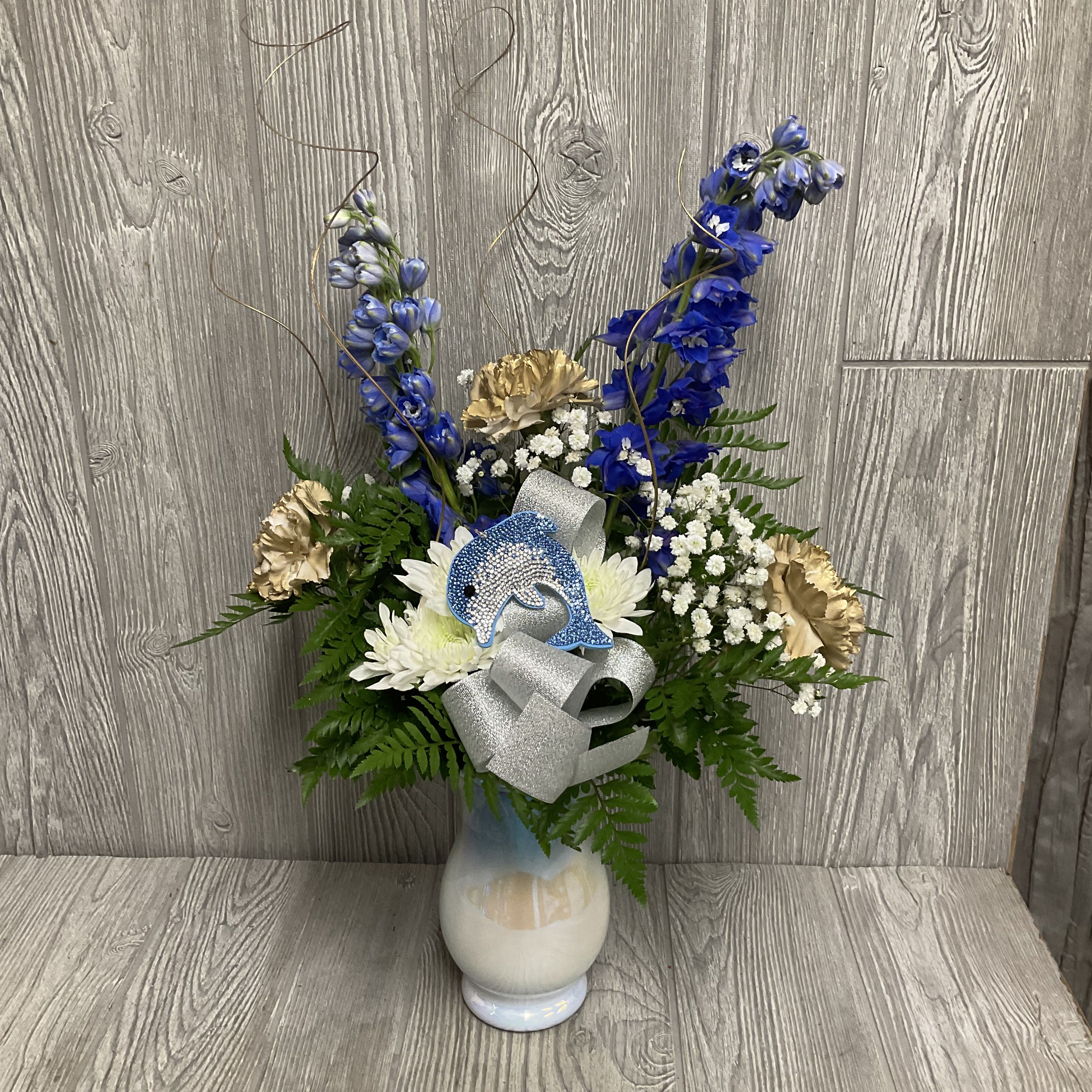 Seaside Sparkle  - A cute arrangement with a rhinestone dolphin keychain. Great for your Delta Delta Delta daughters and sisters. Flowers may vary and vase shape may vary.
