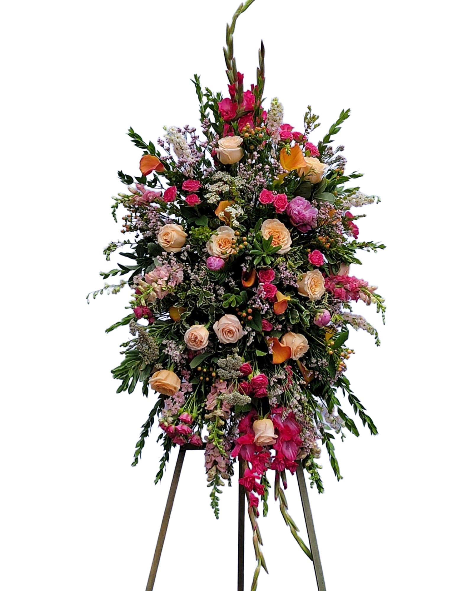 Happy Memories Standing Spray  - This bright and elegant sympathy piece features gladiolas, roses and more in a peach and pink tones. 