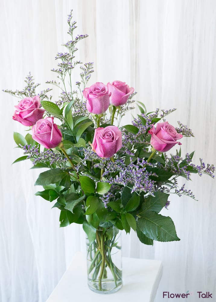 Flower Talk's Purple Enchantment Bouquet - Half a dozen purple roses with limonium. 