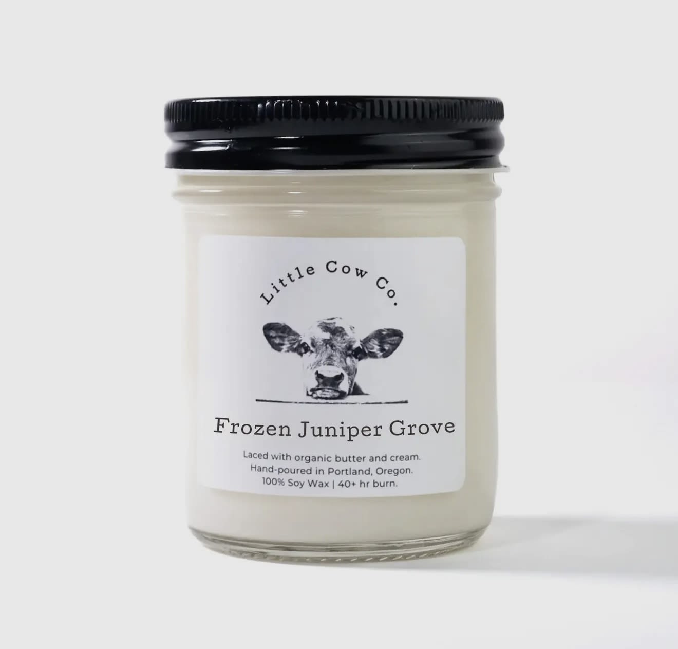Frozen Juniper Grove - Jar Candle - If you could capture the feeling of hiking through the Three Sisters Wilderness in Oregon on a late winter's day, it would smell like the Frozen Juniper Grove candle. The fresh, cool pepperiness of juniper mingles with the rich loaminess of volcanic soil, accented by a subtle sweet trace of pear. It's the smell of the Eastern Oregon wilderness on the cusp of bursting into Spring.  100% natural soy wax. Laced with organic butter. Reusable jar with sealing lid.  50+ hr. burn time