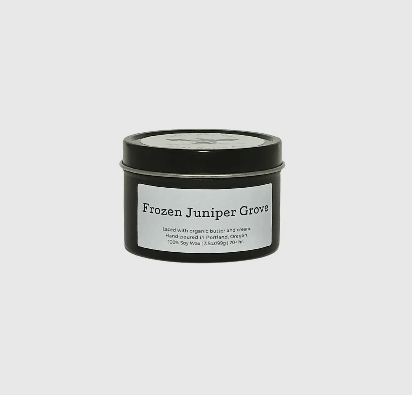 Frozen Juniper Grove - Travel Tin - If you could capture the feeling of hiking through the Three Sisters Wilderness in Oregon on a late winter's day, it would smell like the Frozen Juniper Grove candle. The fresh, cool pepperiness of juniper mingles with the rich loaminess of volcanic soil, accented by a subtle sweet trace of pear. It's the smell of the Eastern Oregon wilderness on the cusp of bursting into Spring.  100% natural soy wax. Laced with organic butter. Reusable jar with sealing lid.  20+ hr. burn time